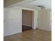 Bright living area with tile flooring and an opening into another room at 614 Chatham Dr, Lakeland, FL 33803