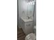 Bathroom featuring a modern vanity with updated fixtures, and new flooring at 615 Avenue S Ne, Winter Haven, FL 33881