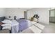 Spacious bedroom with a dedicated desk area and ensuite bathroom access at 6237 Aralia Ivy Ln, Winter Garden, FL 34787
