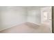 This bedroom has neutral carpet, white walls, and a closet at 6237 Aralia Ivy Ln, Winter Garden, FL 34787