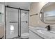 Bathroom with granite vanity top, updated fixtures, toilet, and tile shower at 6430 Russo Rd, Bartow, FL 33830
