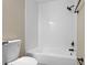 Updated bathroom showcasing tiled shower and tub at 6430 Russo Rd, Bartow, FL 33830