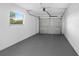 Spacious garage with window and automatic door for convenient parking at 6430 Russo Rd, Bartow, FL 33830