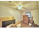 Bedroom featuring carpet flooring, ceiling fan, and traditional furnishings at 6510 Oak Hammock Ln, Winter Haven, FL 33884
