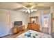 Bedroom featuring carpet flooring, ceiling fan, and traditional furnishings at 6510 Oak Hammock Ln, Winter Haven, FL 33884