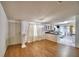 Bright dining area with hardwood floors and direct access to the kitchen at 6510 Oak Hammock Ln, Winter Haven, FL 33884