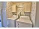 Bright laundry room features a white washer, dryer, and upper cabinets for convenient storage at 6510 Oak Hammock Ln, Winter Haven, FL 33884