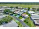 Neighborhood aerial view showcasing nearby green space, with the home indicated by arrow at 6603 Scenic Point Se Dr, Winter Haven, FL 33884