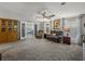Bright and open living area with large sofas and natural lighting at 6603 Scenic Point Se Dr, Winter Haven, FL 33884