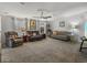 Spacious living room featuring ample seating and tasteful decor at 6603 Scenic Point Se Dr, Winter Haven, FL 33884