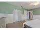 Cozy bedroom with a closet and doors leading to other rooms at 6754 Winterset Gardens Rd, Winter Haven, FL 33884
