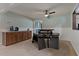 Casual dining area with a modern table and chairs set, along with built in storage at 6754 Winterset Gardens Rd, Winter Haven, FL 33884