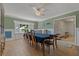 Traditional dining room with a wood china cabinet and a view of the outside at 6754 Winterset Gardens Rd, Winter Haven, FL 33884