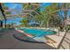 Stunning in-ground pool with screened enclosure, ideal for outdoor relaxation and enjoyment at 6754 Winterset Gardens Rd, Winter Haven, FL 33884