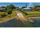 Enjoy water access with a boat launch ramp and lovely lawn at 6754 Winterset Gardens Rd, Winter Haven, FL 33884