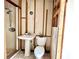 Bathroom undergoing renovation with new fixtures and essential framework at 799 W Lake Otis Dr, Winter Haven, FL 33880