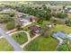 Breathtaking aerial view of the property highlighting the lush landscaping and serene residential surroundings at 8947 Oakwood Dr, Lake Wales, FL 33898