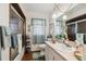 Bathroom with shower and vanity, featuring modern fixtures and décor at 8947 Oakwood Dr, Lake Wales, FL 33898