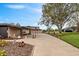 Spacious driveway with covered parking and ample room for guest parking and mature landscaping at 8947 Oakwood Dr, Lake Wales, FL 33898