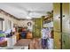 Cozy hobby room features built-in storage, a ceiling fan, and ample workspace at 8947 Oakwood Dr, Lake Wales, FL 33898