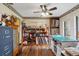 Bright hobby room with vintage decor, wooden floors, and a variety of storage options at 8947 Oakwood Dr, Lake Wales, FL 33898