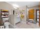 Well-lit bathroom with ceramic tile flooring, neutral walls, and glass-door shower at 903 S Lakeview Ave, Bartow, FL 33830