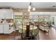 Sunlit eat-in kitchen flows into the living room with a great view of the outside and abundant natural light at 903 S Lakeview Ave, Bartow, FL 33830