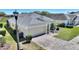 An overhead view of a home showing the driveway and manicured front yard at 916 Balmoral Dr, Davenport, FL 33896