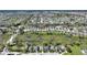 Aerial shot of the home located next to a retention pond at 916 Balmoral Dr, Davenport, FL 33896