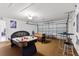 Spacious game room with air hockey, foosball, and bar table offering fun and entertainment at 916 Balmoral Dr, Davenport, FL 33896
