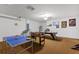 Spacious game room with foosball table, ping pong, and entertainment options at 916 Balmoral Dr, Davenport, FL 33896