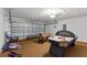 Spacious game room with air hockey, foosball, basketball hoops and ping pong for fun and entertainment at 916 Balmoral Dr, Davenport, FL 33896
