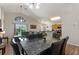 Open concept living space offering views to the pool and backyard at 916 Balmoral Dr, Davenport, FL 33896
