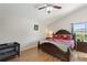 Spacious main bedroom with ample natural light, wood floors and ceiling fan at 916 Balmoral Dr, Davenport, FL 33896