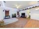 Bright living room featuring ceiling fan and light trim at 7726 Ashford Dr, Lakeland, FL 33810