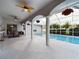 Inviting screened-in pool with ample patio space, perfect for relaxing and entertaining outdoors at 7726 Ashford Dr, Lakeland, FL 33810