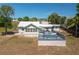 Exterior view of backyard featuring a pool and deck, great for entertaining at 100 Masterpiece Rd, Lake Wales, FL 33898
