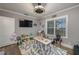 Inviting playroom with toys, table, chairs, television and natural light at 100 Masterpiece Rd, Lake Wales, FL 33898
