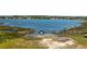 Waterfront property with private dock for boating and enjoying lake activities at 100 Masterpiece Rd, Lake Wales, FL 33898