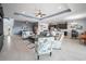 Bright and airy living room featuring tile floors, an open layout, and stylish furnishings at 1057 Sawgrass Dr, Winter Haven, FL 33884