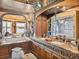 Bathroom featuring custom vanity, double sinks, and lake views at 125 E Graham Park Dr, Haines City, FL 33844