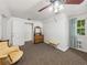 Bedroom featuring neutral walls and carpet with a dresser and a chair at 125 E Graham Park Dr, Haines City, FL 33844
