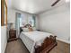 Bedroom with natural light, carpet floors and a light gray comforter at 125 E Graham Park Dr, Haines City, FL 33844