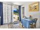Cozy dining area features a table set for two and access to the pool at 125 E Graham Park Dr, Haines City, FL 33844