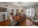 Formal dining room with a chandelier, a large table, and elegant furnishings at 125 E Graham Park Dr, Haines City, FL 33844