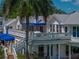 Multi-level home with a private outdoor deck, stairs, and balconies at 125 E Graham Park Dr, Haines City, FL 33844