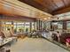 Spacious living room with lake views, natural light, and carpeted flooring at 125 E Graham Park Dr, Haines City, FL 33844