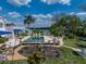Stunning backyard pool area with mature landscaping offering amazing views and privacy at 125 E Graham Park Dr, Haines City, FL 33844
