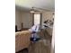 Inviting living area with stylish seating, ceiling fan and modern decor at 1403 Hidden Creek Ln, Winter Haven, FL 33880