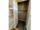 View of closet with wood flooring and rod for hanging at 180 Old Connersville Rd, Bartow, FL 33830